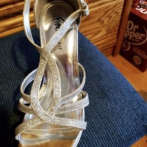 Sparkly silver dress shoes.  New.  Never used.  Size 10